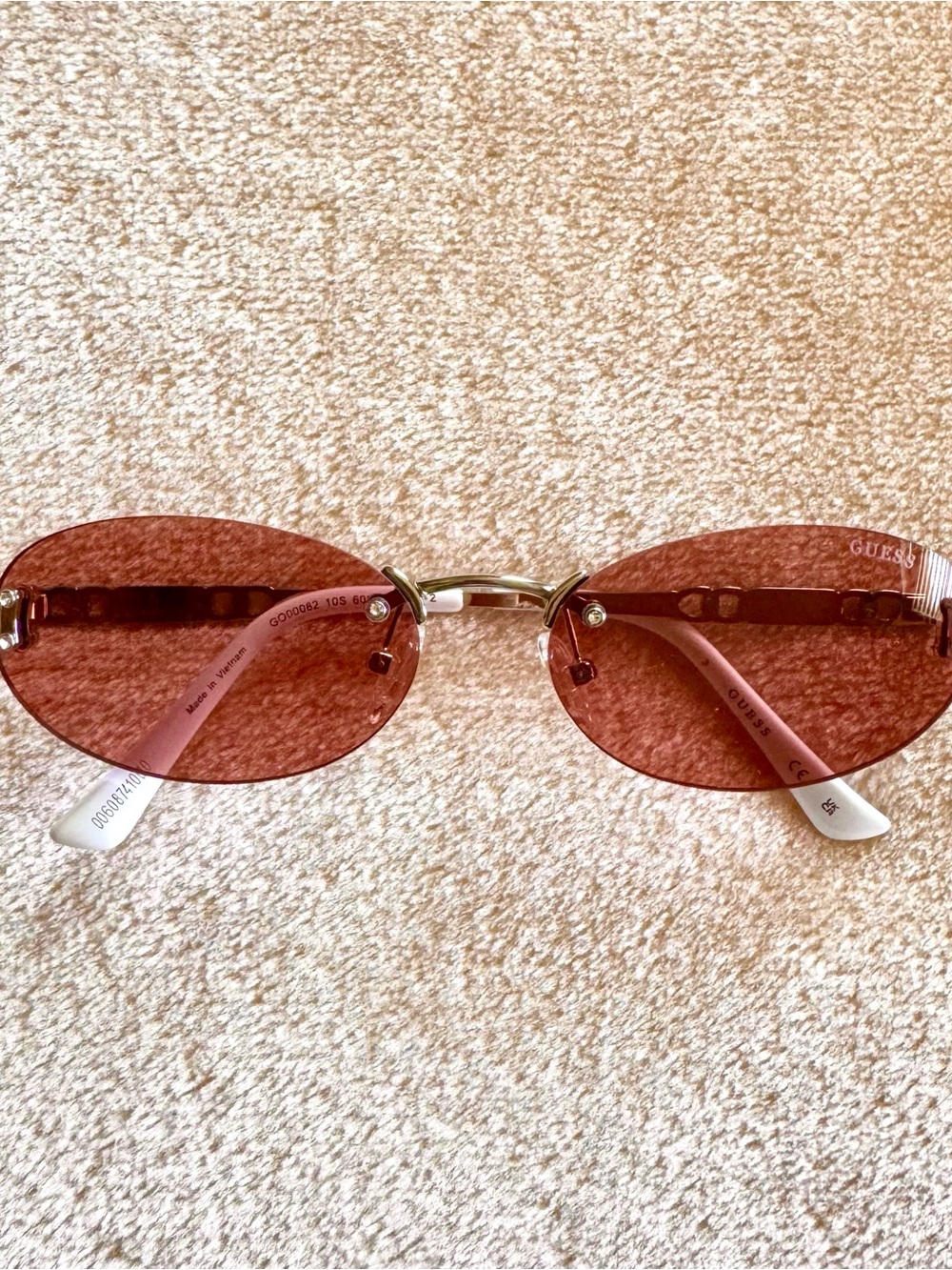 Y2K-Style Guess Rimless Pink Oval Sunglasses